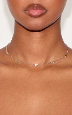 PrettyLittleThing Gold Recycled Brass Dainty Heart Multi-Pendant Short Chain Necklace -FRAME Clothing Shop bea538b134a37743a1bab02efd5ab8b62558ac78 CMV3034 3 gold dainty heart short chain necklace