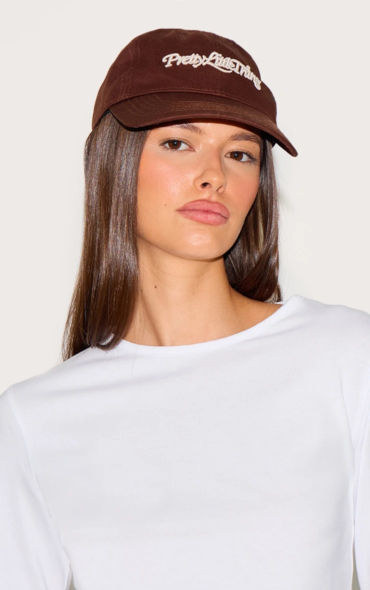 PrettyLittleThing Cream with Chocolate Embroidery Wordmark – Curved Bill Adjustable Cap 1 PrettyLittleThing Cream with Chocolate Embroidery Wordmark – Curved Bill Adjustable Cap