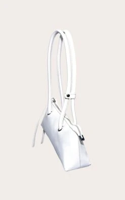 PrettyLittleThing Off White Patent PU Elongated Handle Shoulder Bag -FRAME Clothing Shop befed9b7b89a1da381c30d35da108a1ae32d2982 CNO0720 4 off white pu elongated handle shoulder bag