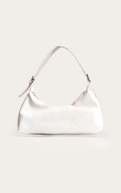 PrettyLittleThing Off White PU Elongated Curved Shoulder Bag – Minimalist Faux Leather Handbag -FRAME Clothing Shop bfbb29e030f91a95a6866c02087d2fe0df44b63b CNM3901 3 cream pu elongated curved shoulder bag