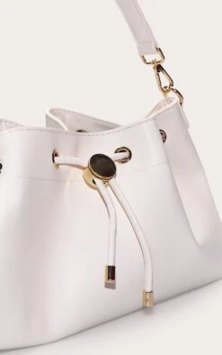 PrettyLittleThing Cream Soft PU Mini Drawstring Shoulder Bag with Gold Hardware -FRAME Clothing Shop cb6199c135da9ec548b469d1156348bda47cff23 CNN2842 5 cream soft pu drawstring shoulder bag