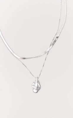 PrettyLittleThing Silver Two-Layer Snake Chain with Gold Pendant Necklace -FRAME Clothing Shop d2d6208ab27f3a78fcd1001d537330b9b6bbd607 CNO2972 3 silver layered snake chain with gold pendant