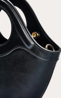 PrettyLittleThing Black Crescent Cross Body Bag – Sleek Faux Leather with Circular Handle 9 PrettyLittleThing Black Crescent Cross Body Bag – Sleek Faux Leather with Circular Handle -FRAME Clothing Shop f394631a51f1b3f1682d54fe65e3dd0e008777be CNO1633 5 black crescent cross body hand bag