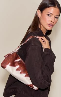 PrettyLittleThing Cow Print Pony Hair Effect Adjustable Shoulder Bag - Black & White
