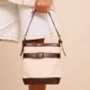 PrettyLittleThing Chocolate Brown PU & Cream Canvas Contrast – Structured Bucket Shoulder Bag