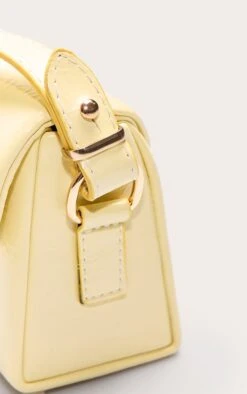 PrettyLittleThing Butter Yellow Faux Leather Rectangle Fold Over Shoulder Bag -FRAME Clothing Shop ffe7d24525a54a19a16a8c56eb93e08a4e40edb7 CNN6305 4 butter yellow rectangle fold over shoulder bag